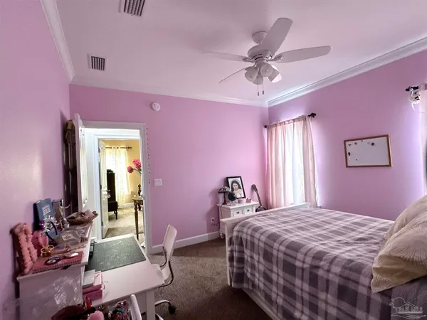 a view of an empty room with a floor to ceiling window