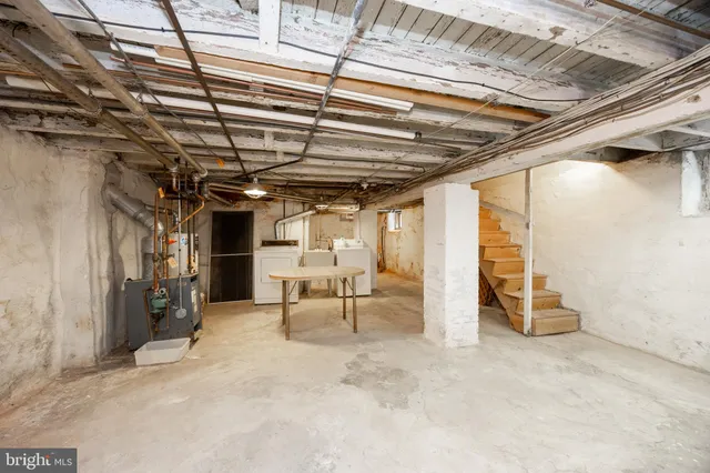 a view of a room with wooden walls