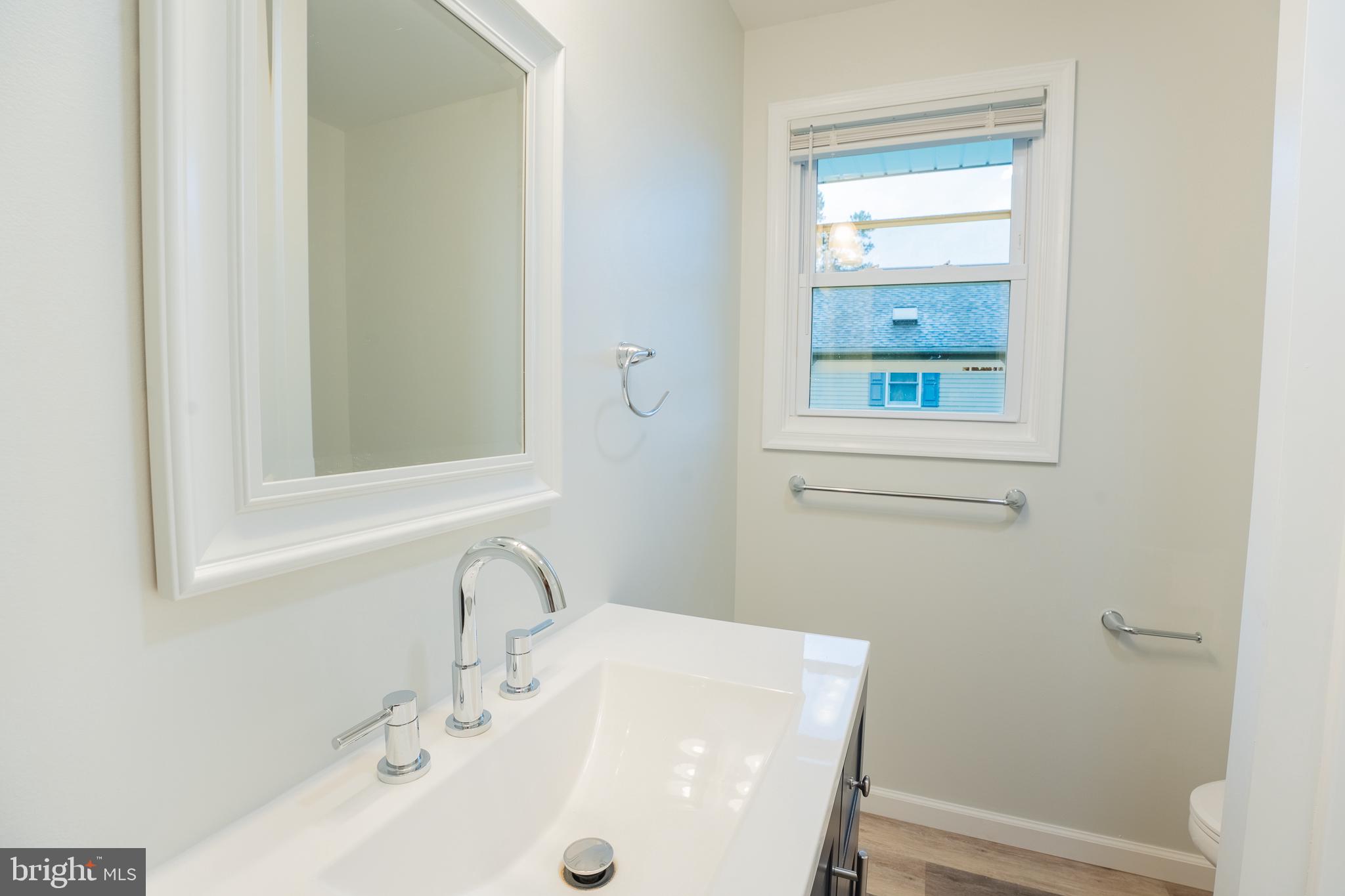 9010 Elks Road Seaford, DE 19973 - Photo 9 of 33 Bright and airy modern bathroom retreat.