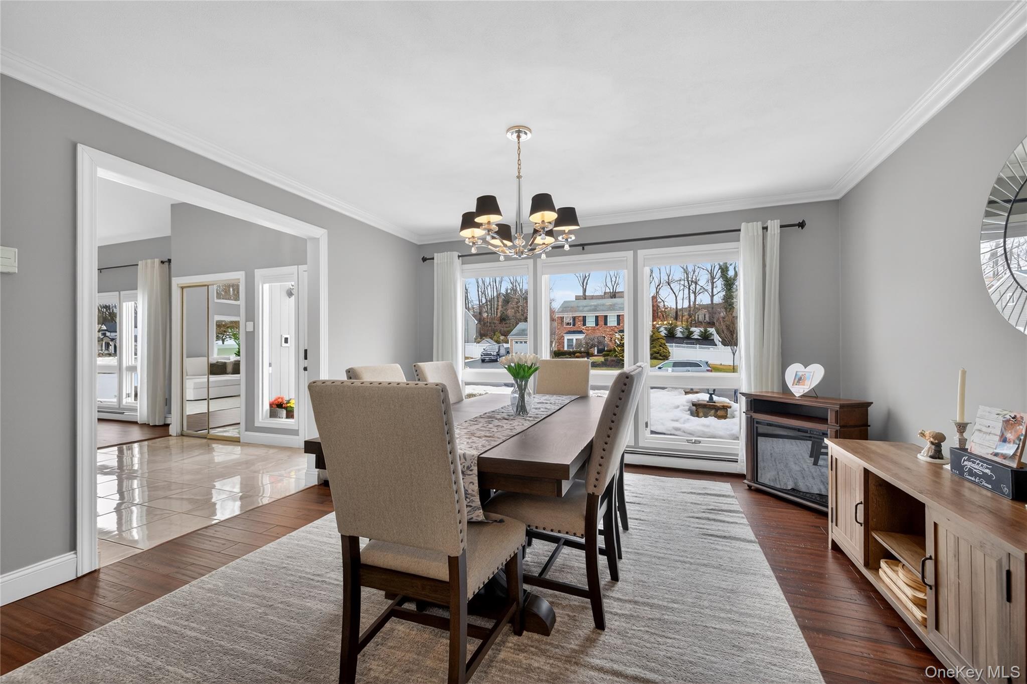 53 Timber Ridge Drive Commack, NY 11725 - Photo 11 of 50 a view of a dining room with furniture window and wooden floor