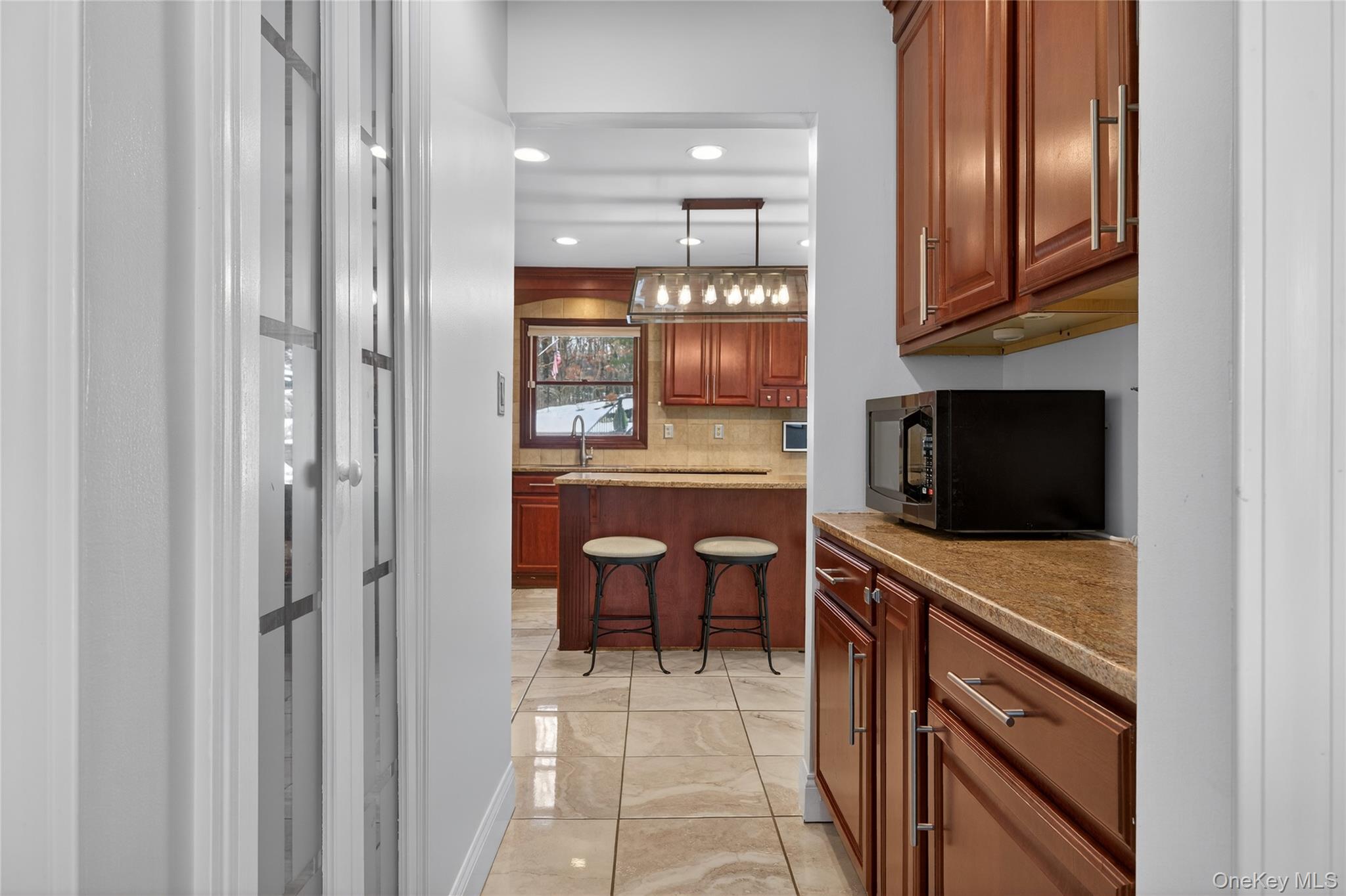 53 Timber Ridge Drive Commack, NY 11725 - Photo 19 of 50 a view of a kitchen with furniture and staircase