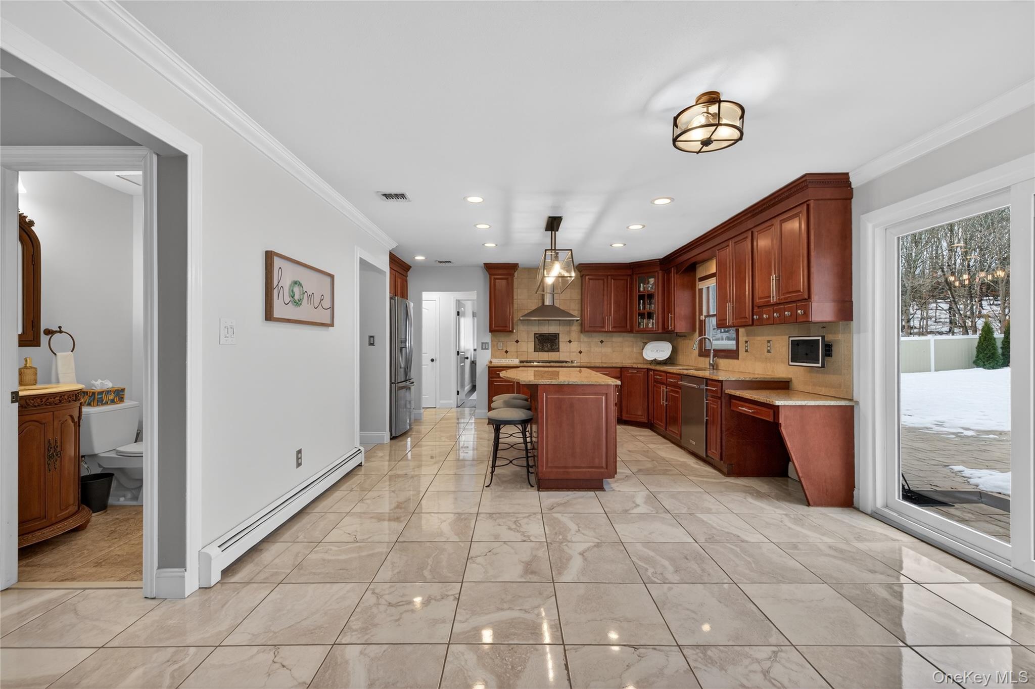 53 Timber Ridge Drive Commack, NY 11725 - Photo 24 of 50 a kitchen with a cabinets a counter top space and stainless steel appliances
