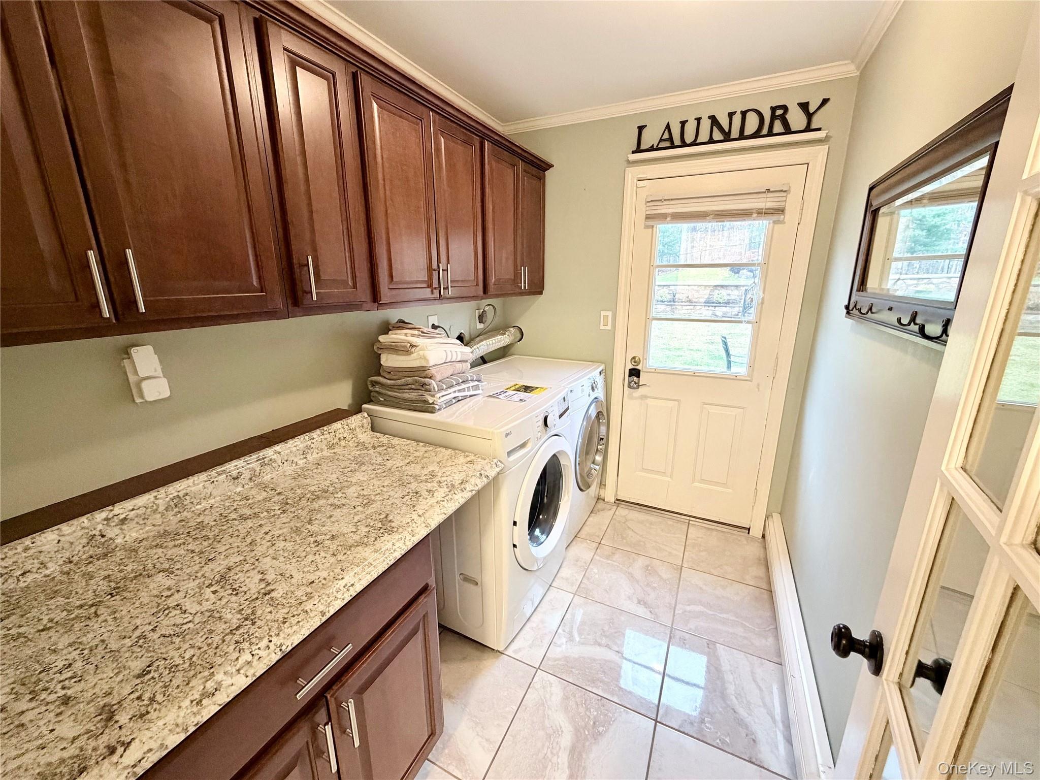 53 Timber Ridge Drive Commack, NY 11725 - Photo 26 of 50 a utility room with a sink a washer and dryer