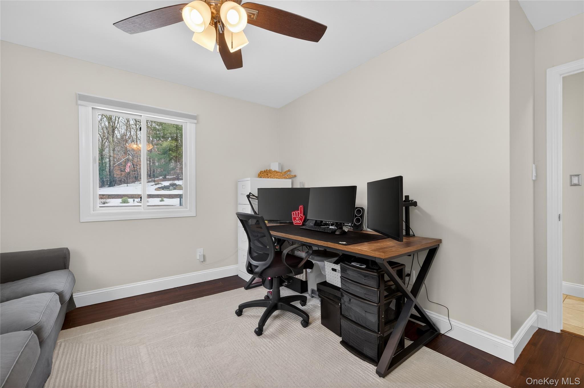 53 Timber Ridge Drive Commack, NY 11725 - Photo 27 of 50 a view of a livingroom with workspace and a window