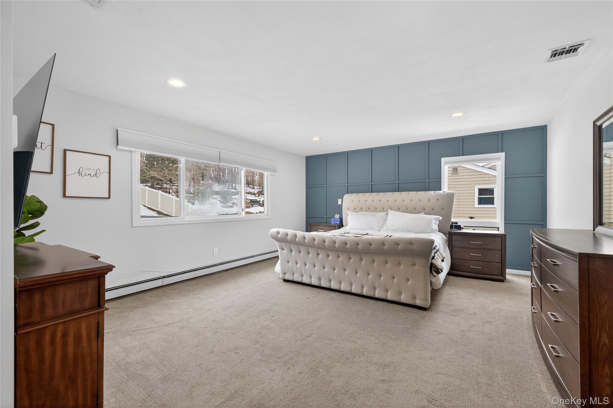 53 Timber Ridge Drive Commack, NY 11725 - Photo 31 of 50 a bedroom with furniture and window