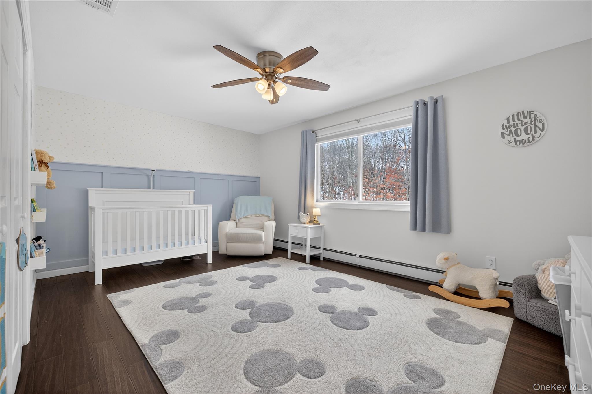 53 Timber Ridge Drive Commack, NY 11725 - Photo 40 of 50 a bedroom with a bed and a window