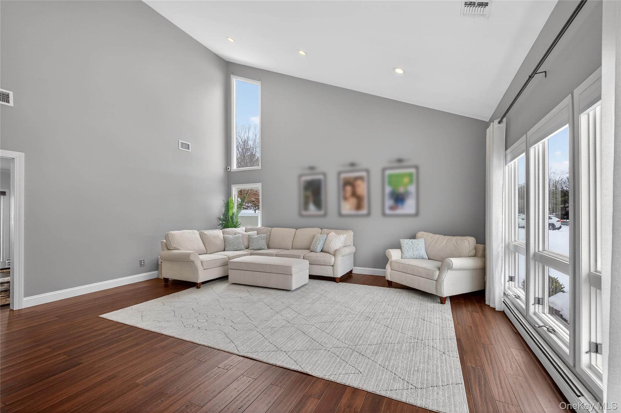 53 Timber Ridge Drive Commack, NY 11725 - Photo 7 of 50 a living room with furniture and a large window