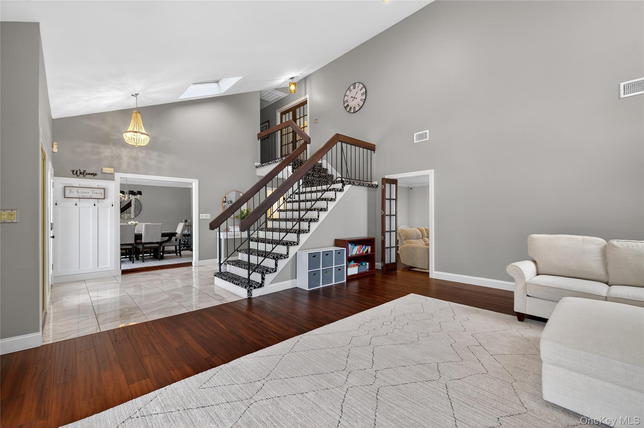 53 Timber Ridge Drive Commack, NY 11725 - Photo 8 of 50 a view of a livingroom with furniture and stairs