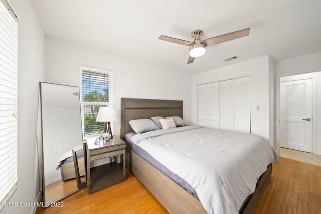 a bedroom with a bed and dresser