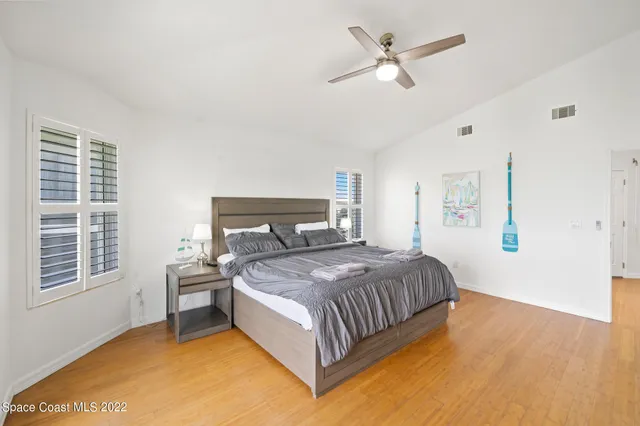 a bedroom with furniture and a bed