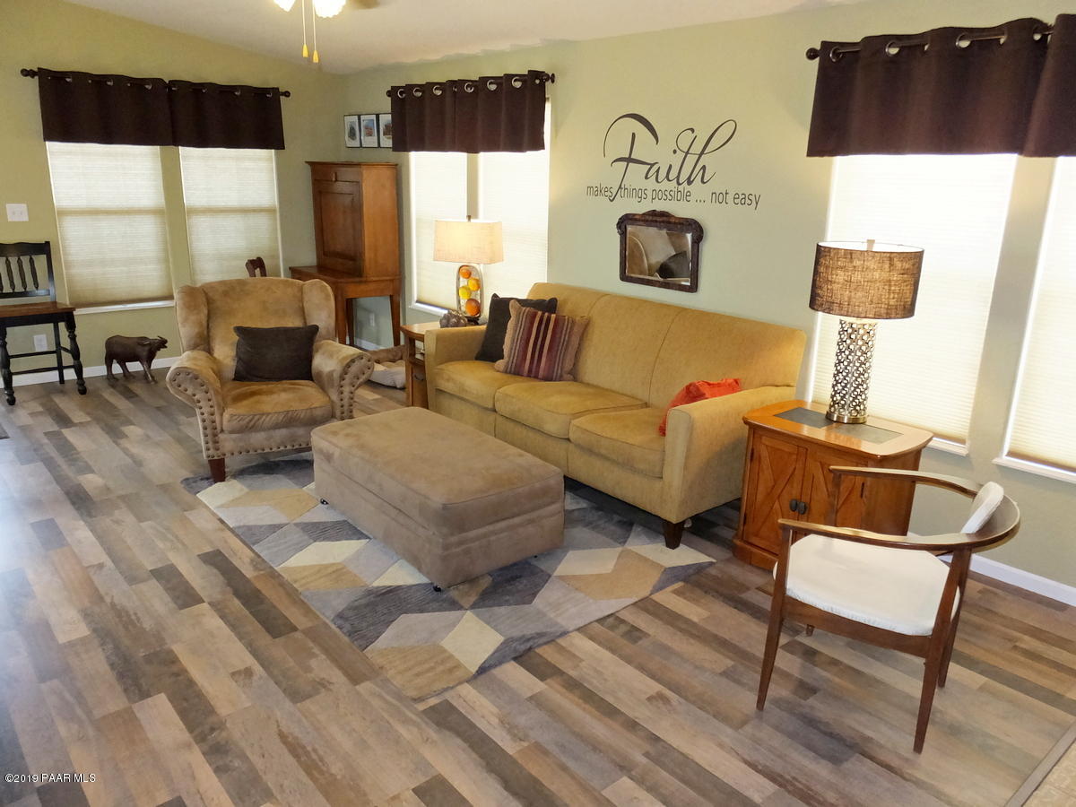 199 North Ambassador Road Dewey, AZ 86327 - Photo 8 of 36 Great Room with Laminate Flooring