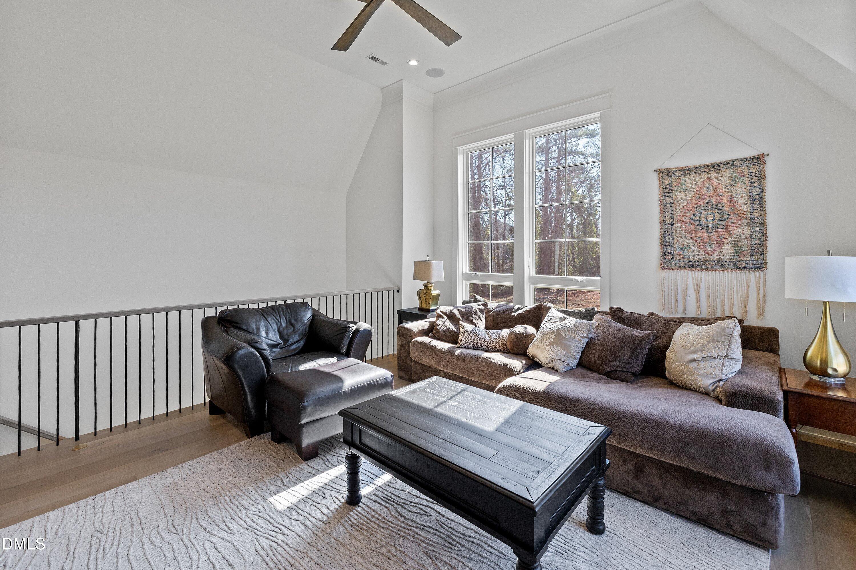 906 Brooks Avenue Raleigh, NC 27607 - Photo 51 of 64 a living room with furniture and a window