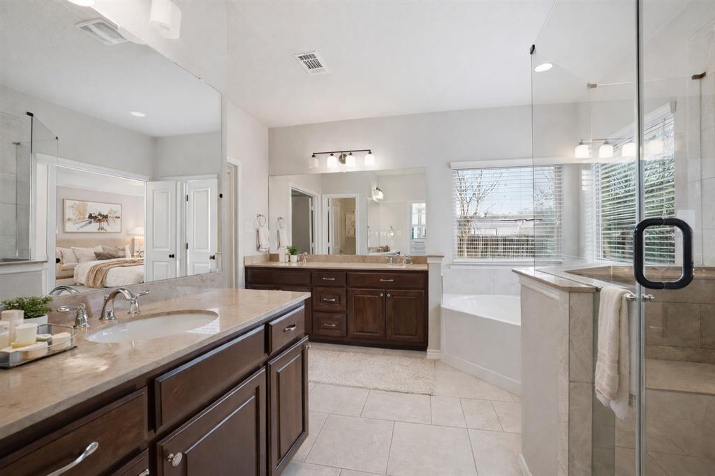 420 Prairie Run Aledo, TX 76008 - Photo 19 of 38 a kitchen with a sink appliances and cabinets