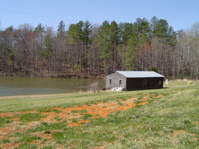 575 Timber Ridge Road Glade Hill, VA 24092 - Photo 13 of 13 Pond w/ Storage Building