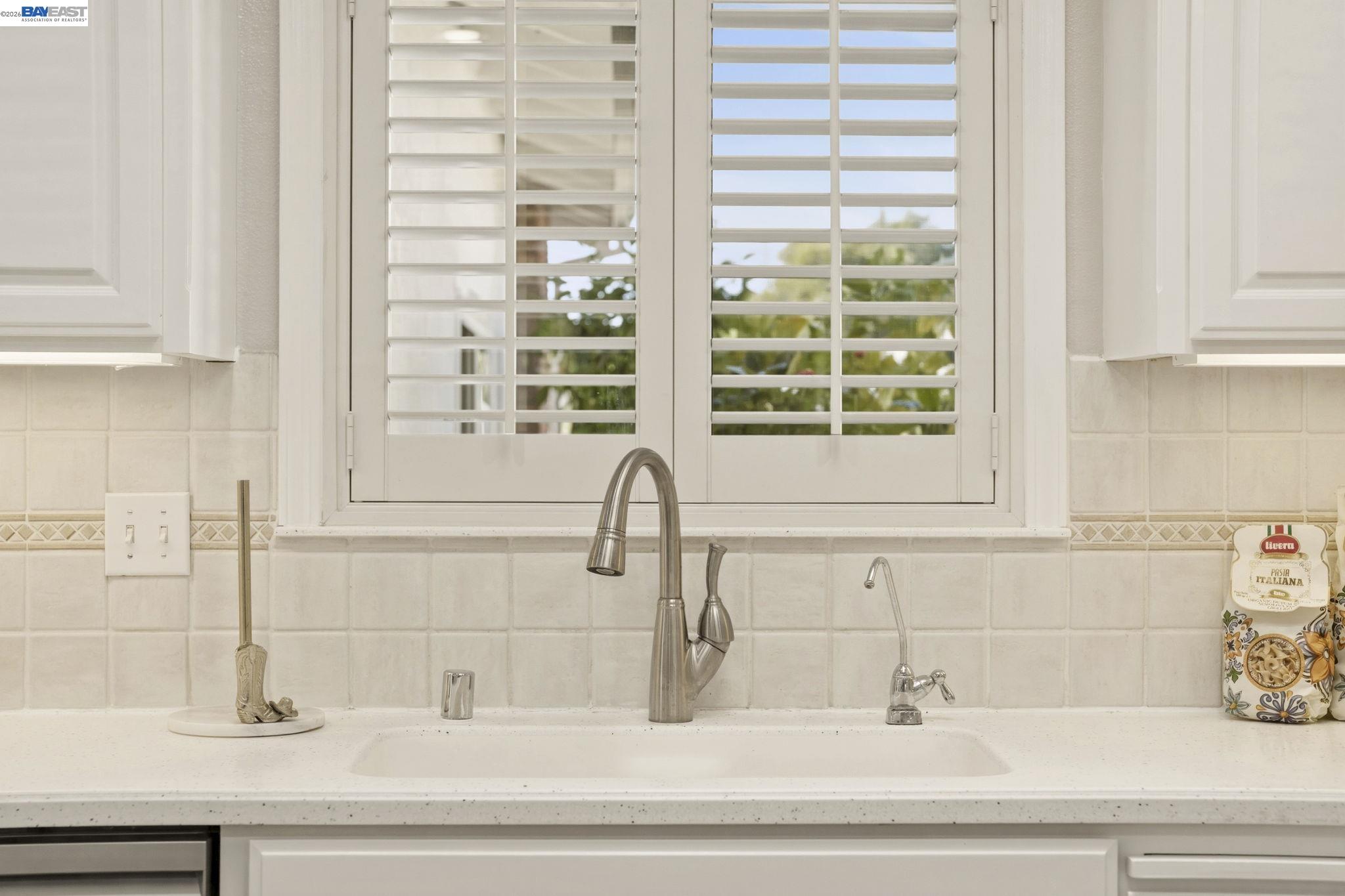 4352 Davis Way Livermore, CA 94550 - Photo 13 of 37 a bathroom with a bathtub and window