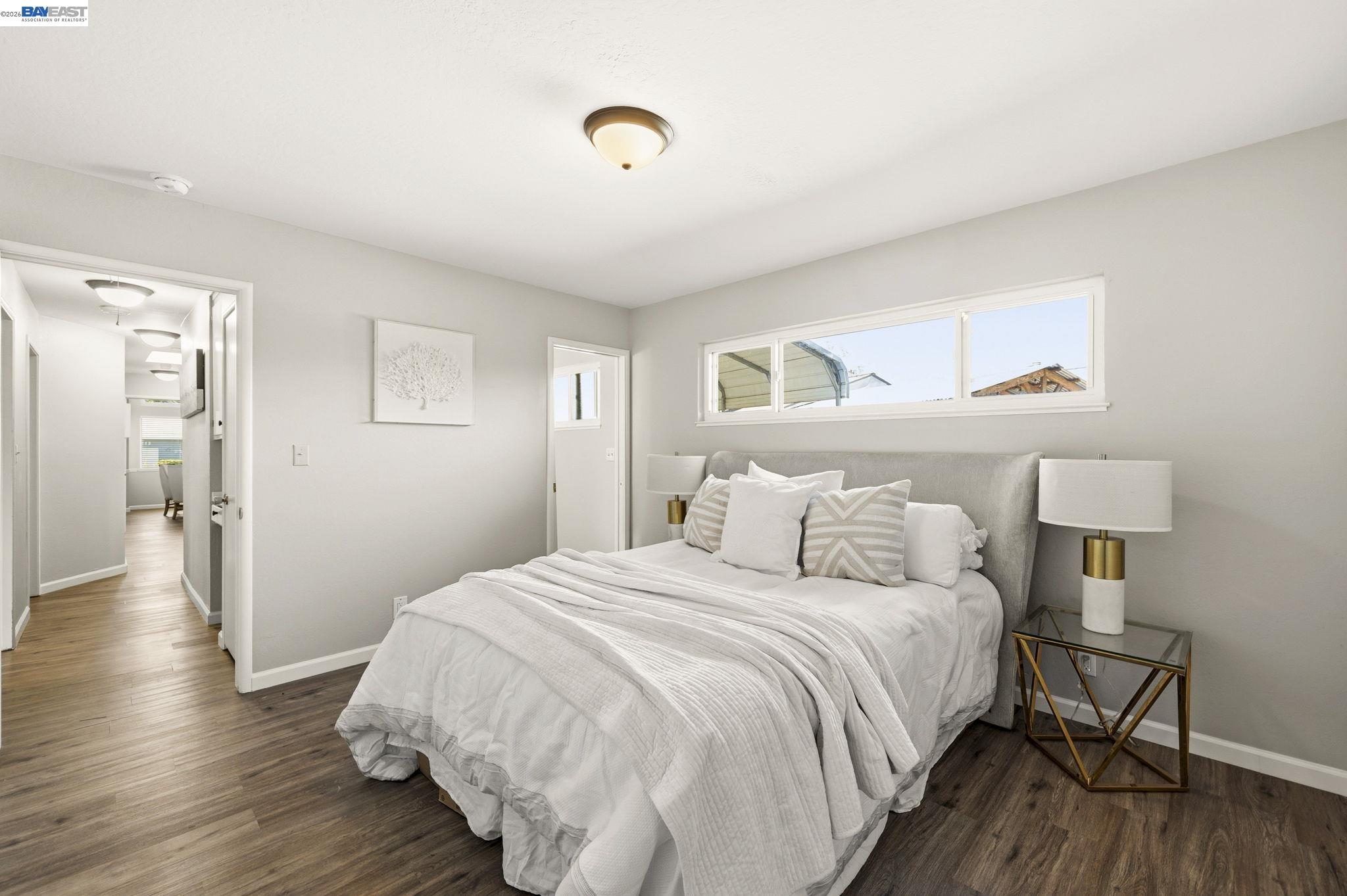 4352 Davis Way Livermore, CA 94550 - Photo 18 of 37 a bedroom with a bed and wooden floor