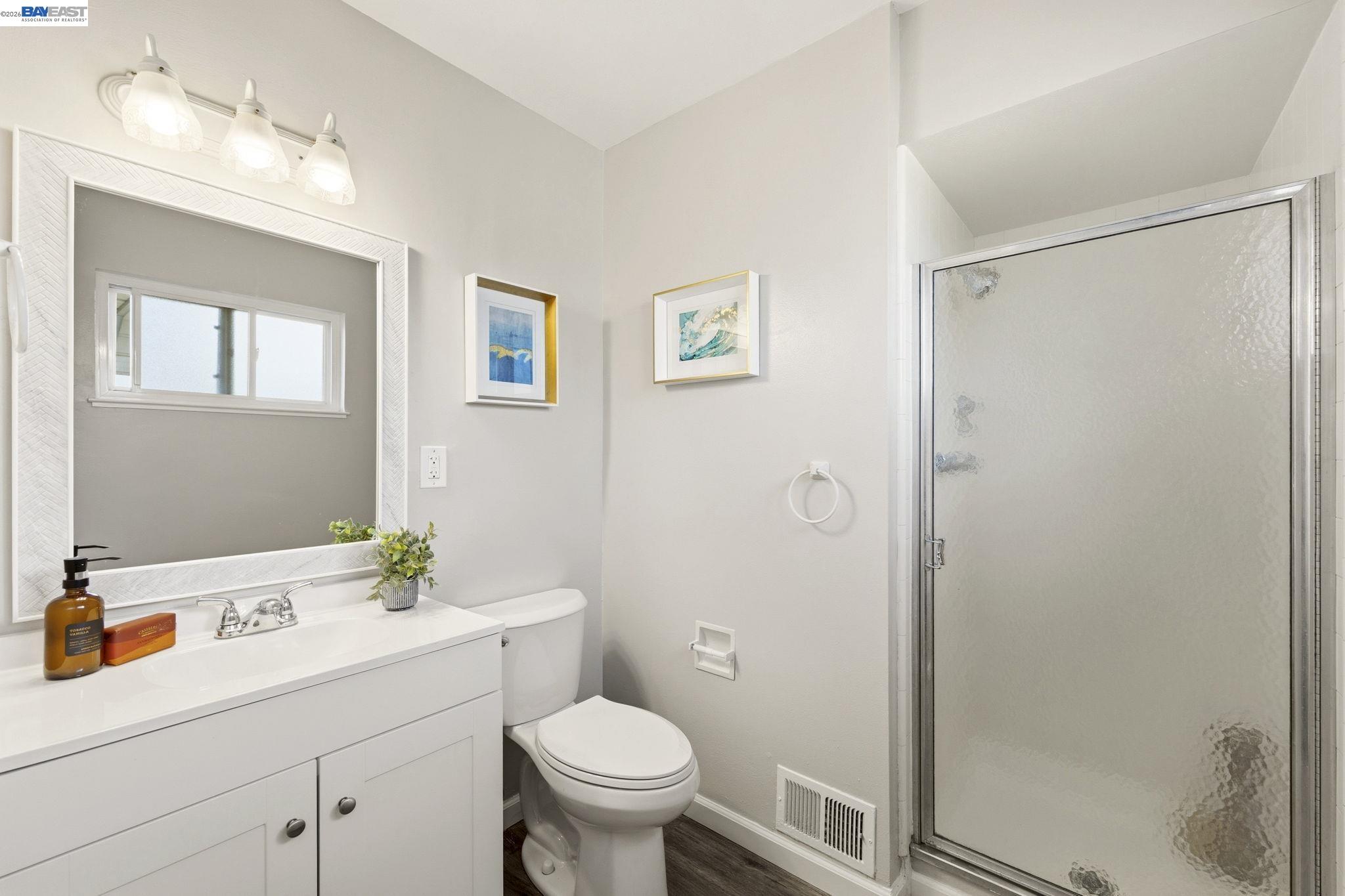 4352 Davis Way Livermore, CA 94550 - Photo 19 of 37 a bathroom with a sink toilet and shower