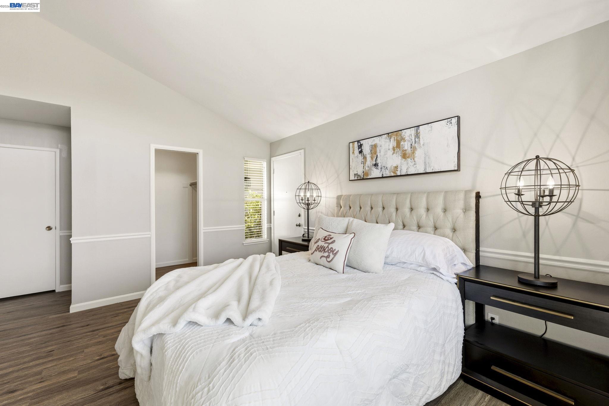 4352 Davis Way Livermore, CA 94550 - Photo 21 of 37 a bedroom with a bed and wooden floor