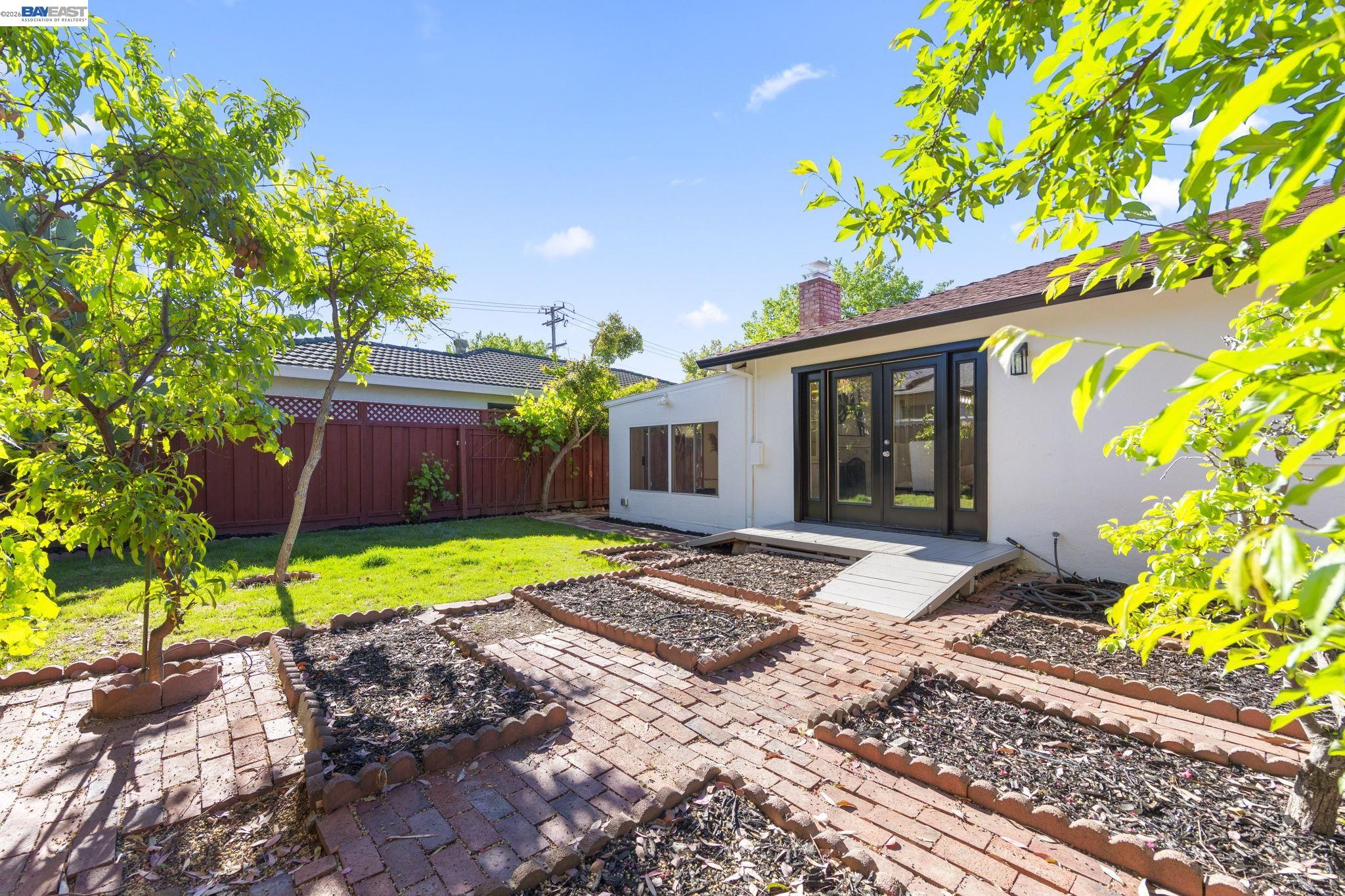 4352 Davis Way Livermore, CA 94550 - Photo 30 of 37 a view of a house with a yard and a garden