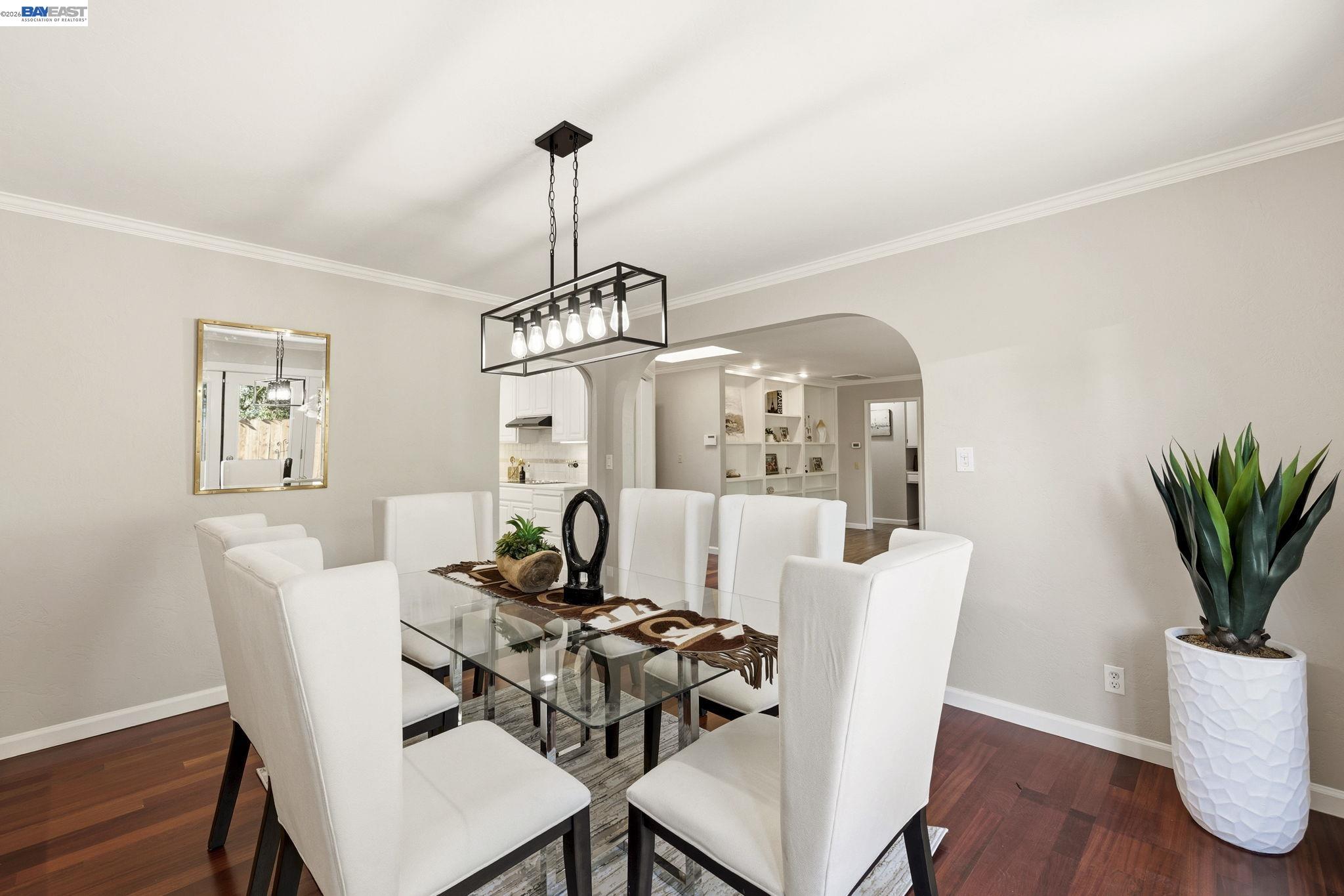 4352 Davis Way Livermore, CA 94550 - Photo 9 of 37 a dining room with furniture potted plants and wooden floor