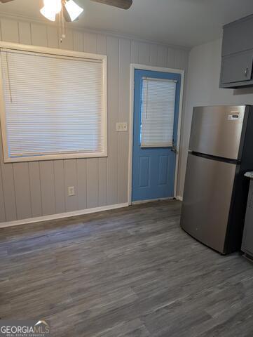 1980 Stanton Road, Unit 15 East Point, GA 30344 - Photo 3 of 4 a view of a refrigerator in kitchen and wooden floor