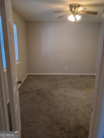 1980 Stanton Road, Unit 15 East Point, GA 30344 - Photo 4 of 4 a view of an empty room with a window