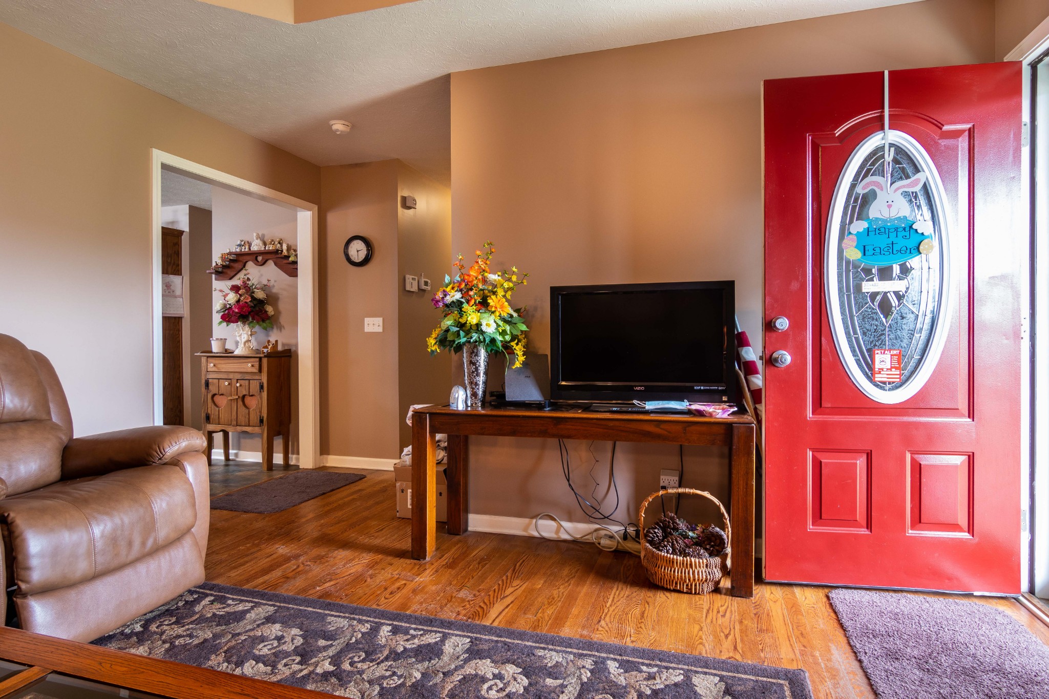 123 Filly Lane Springfield, TN 37172 - Photo 3 of 23 a living room with furniture a flat screen tv and a fireplace