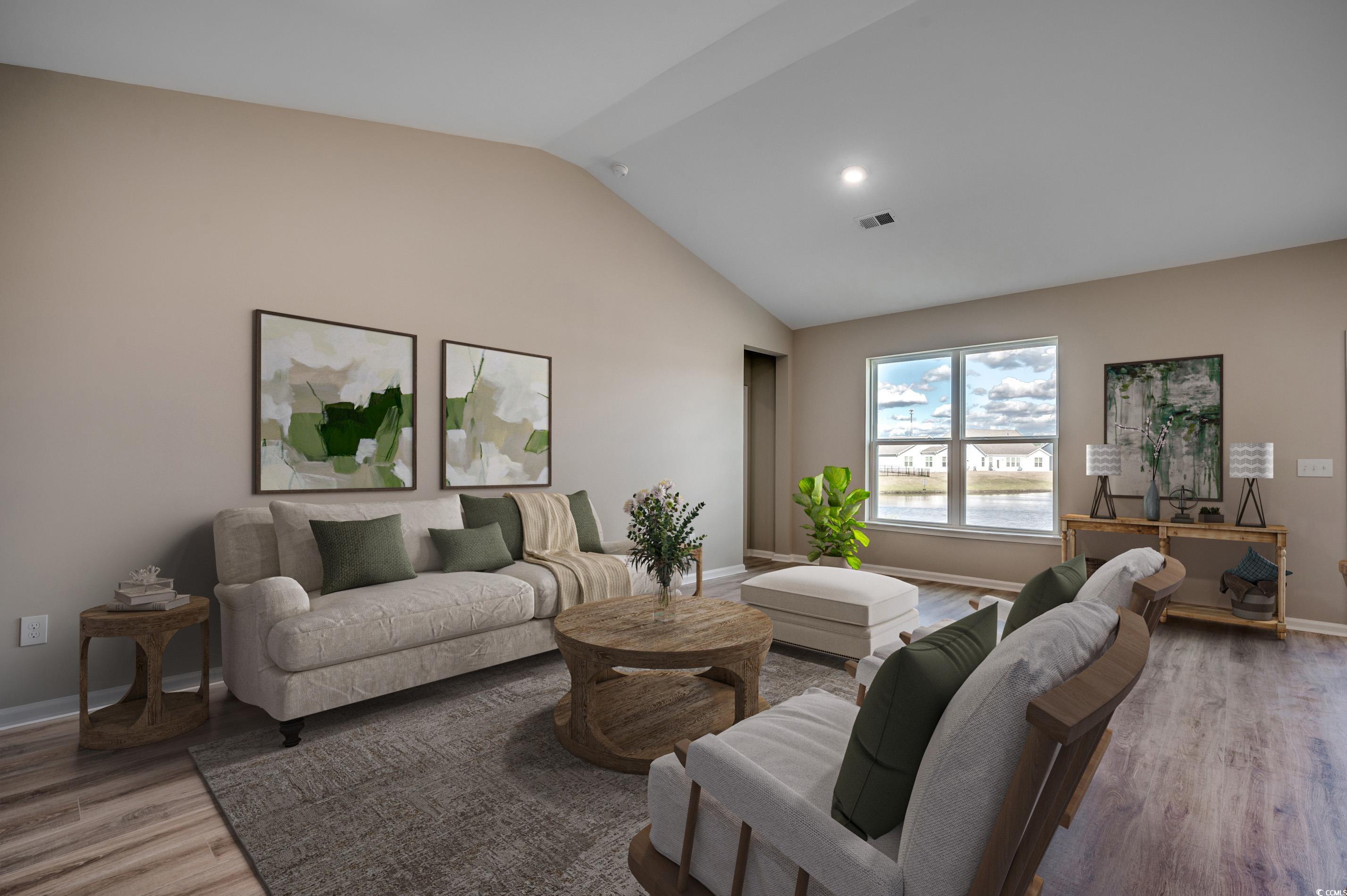 353 Kapalua Loop Little River, SC 29566 - Photo 5 of 11 Living area featuring light wood-style floors, vaulted ceiling, and recessed lighting