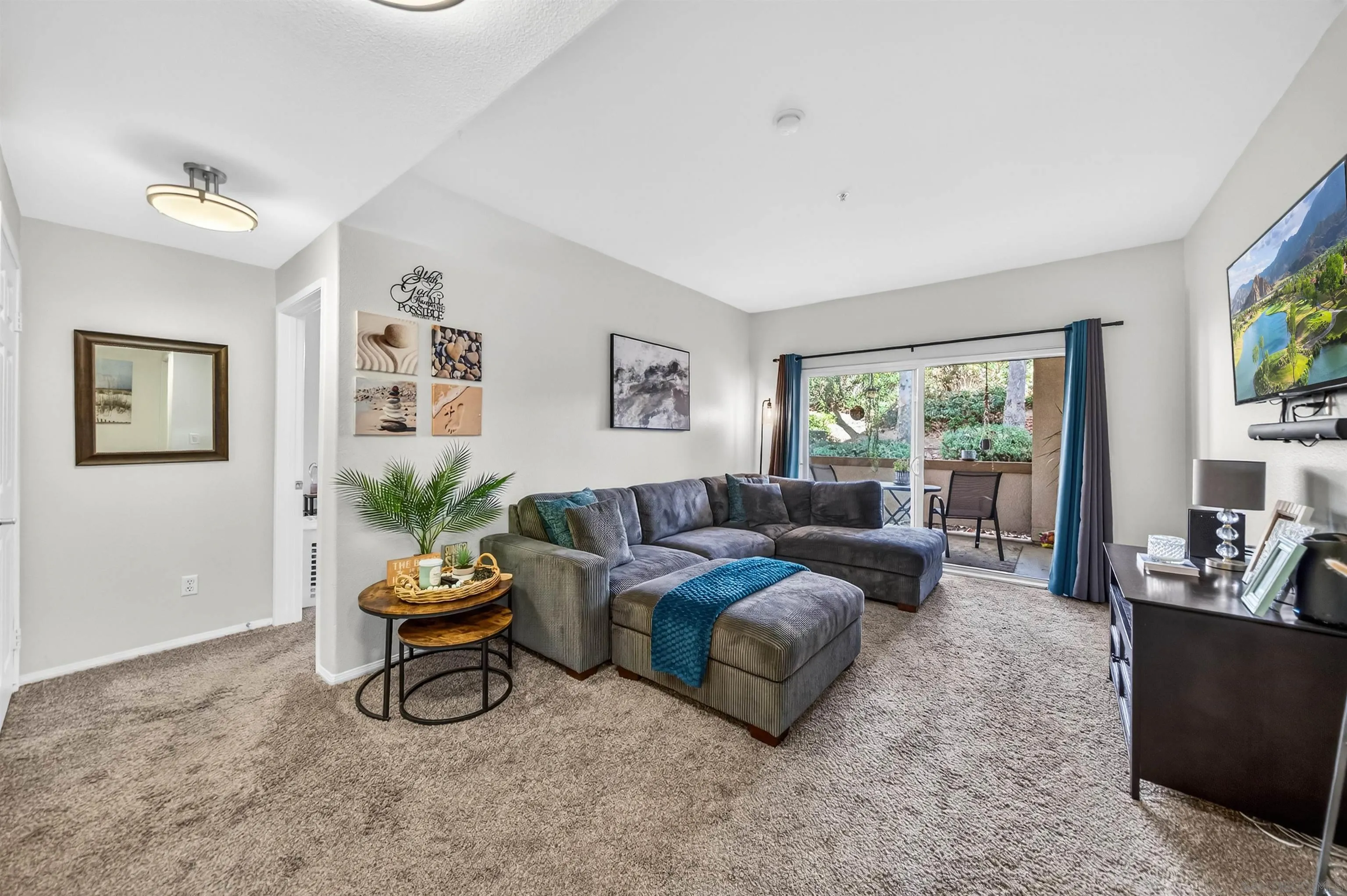 44706 Adam Lane Temecula, CA 92592 - Photo 15 of 36 a living room with furniture and a large window