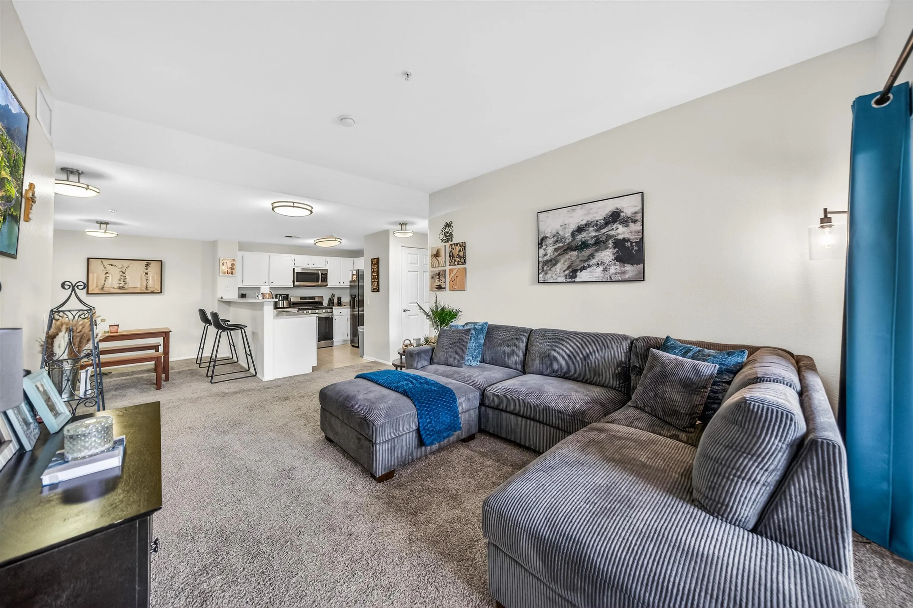 44706 Adam Lane Temecula, CA 92592 - Photo 17 of 36 a living room with furniture and kitchen view