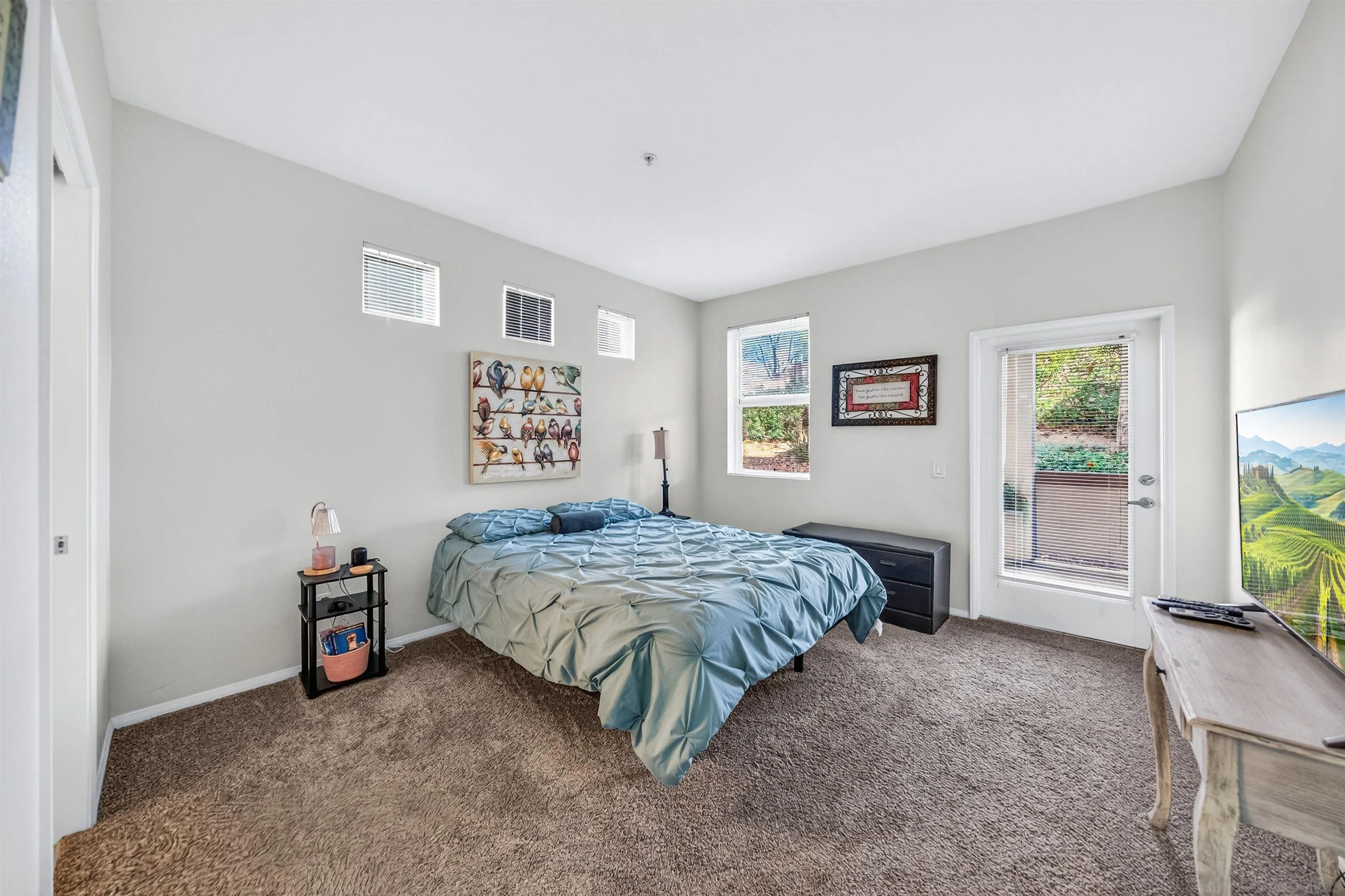 44706 Adam Lane Temecula, CA 92592 - Photo 19 of 36 a bed sitting in a bedroom next to a window