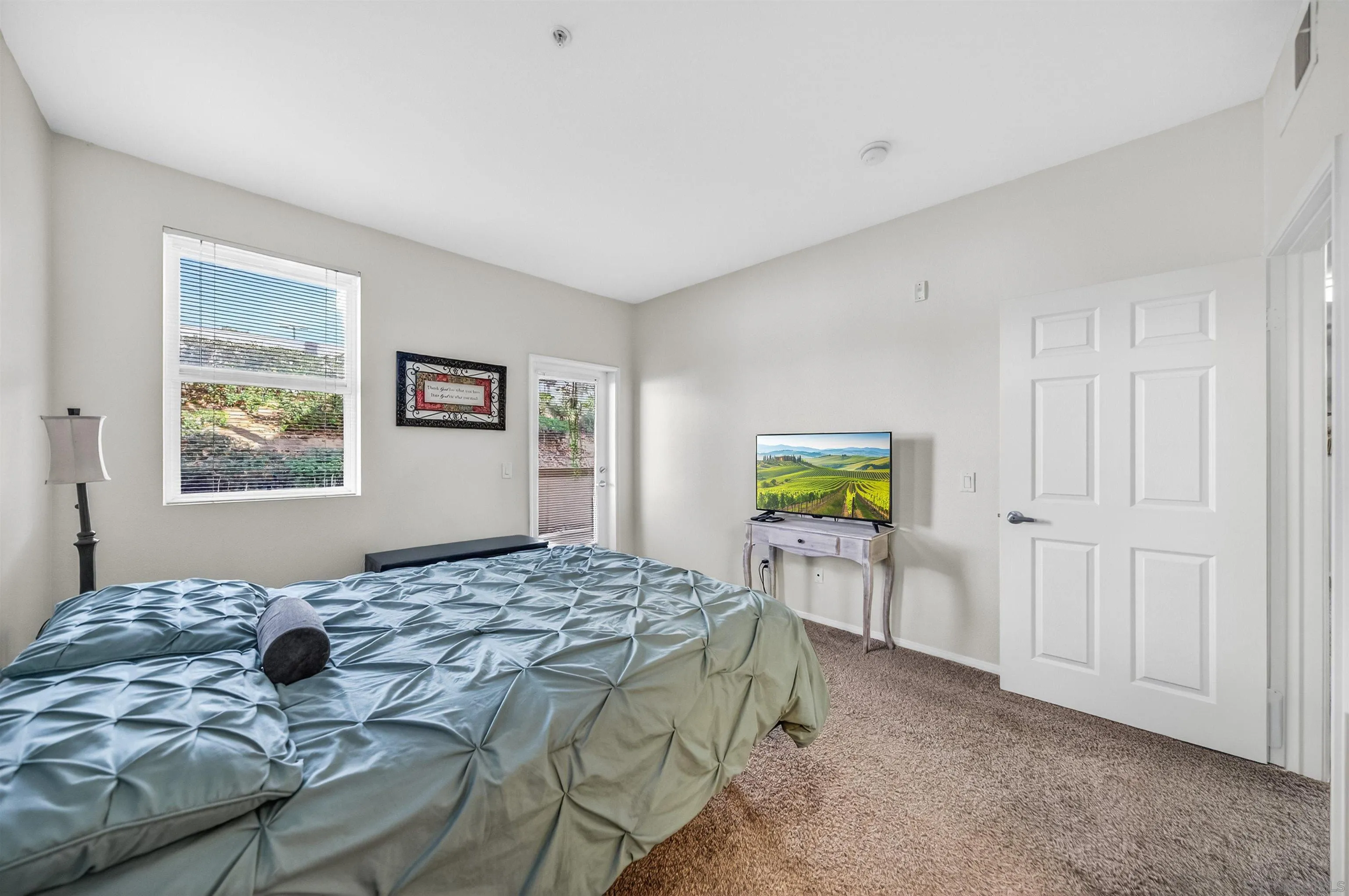 44706 Adam Lane Temecula, CA 92592 - Photo 22 of 36 a bedroom with a bed and a window