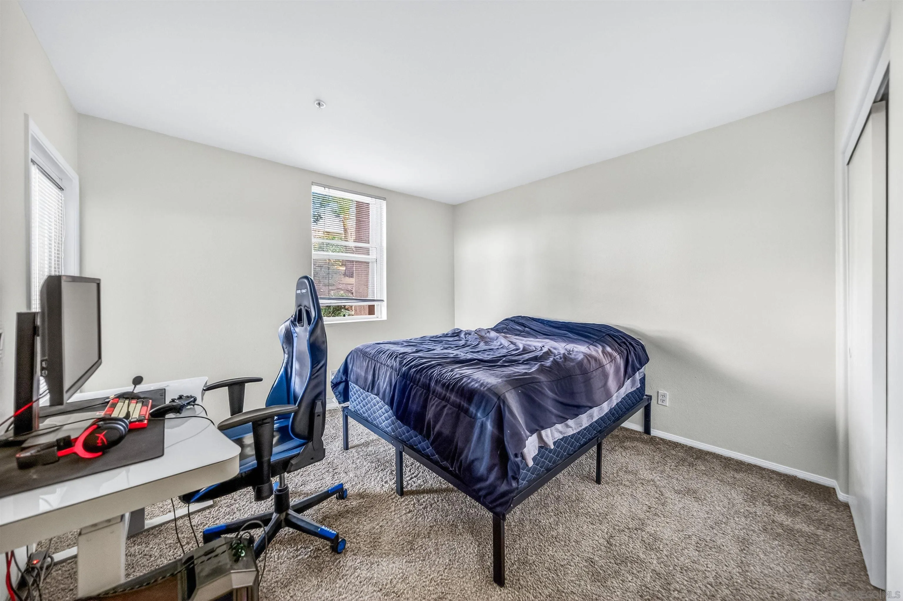 44706 Adam Lane Temecula, CA 92592 - Photo 26 of 36 a bedroom with a bed a computer on desk and a dresser next to a window