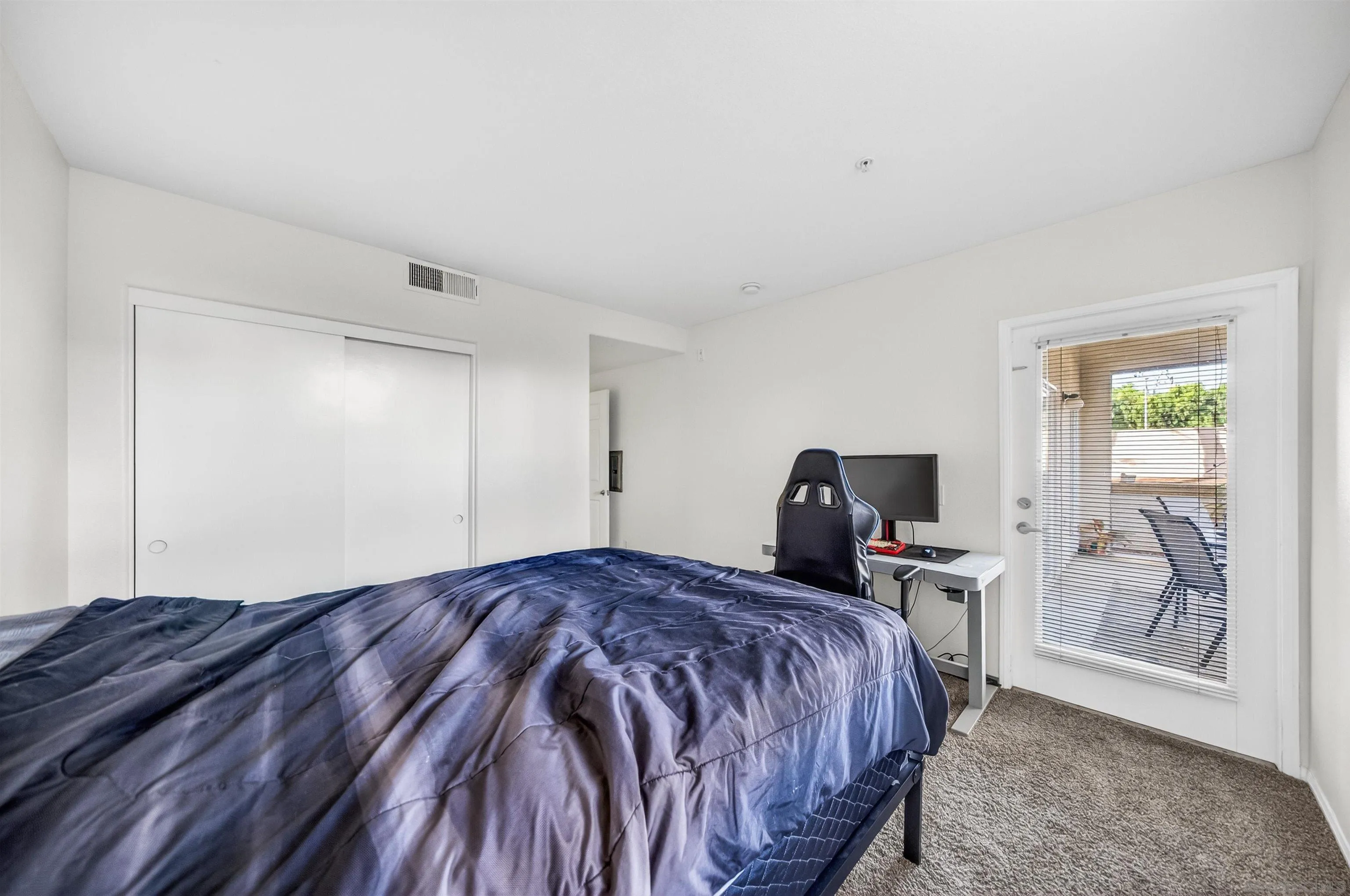 44706 Adam Lane Temecula, CA 92592 - Photo 27 of 36 a bedroom with a bed and wooden floor