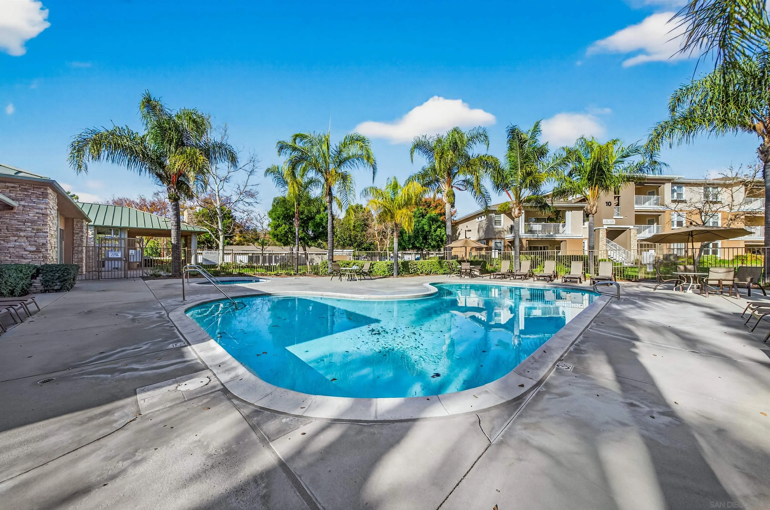 44706 Adam Lane Temecula, CA 92592 - Photo 33 of 36 a view of a swimming pool with a lounge chairs