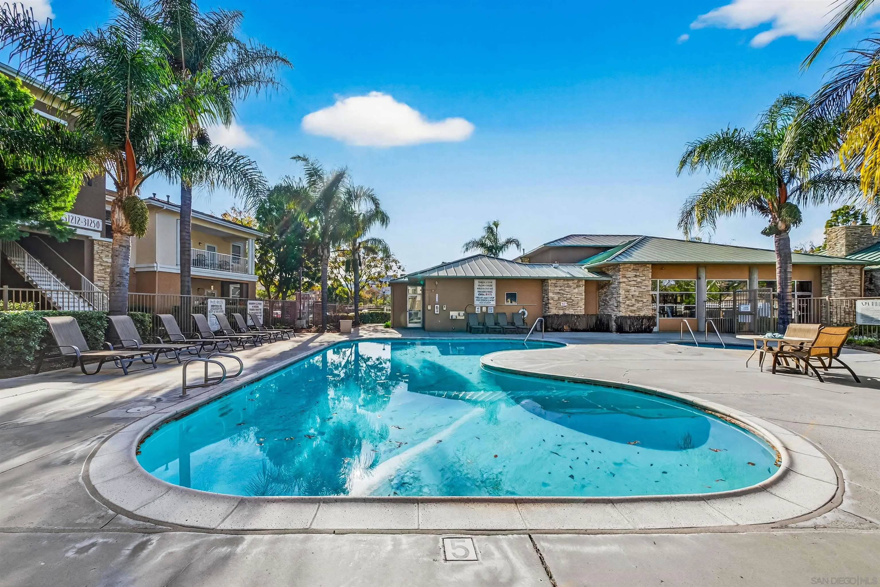 44706 Adam Lane Temecula, CA 92592 - Photo 34 of 36 a view of a house with swimming pool and sitting area