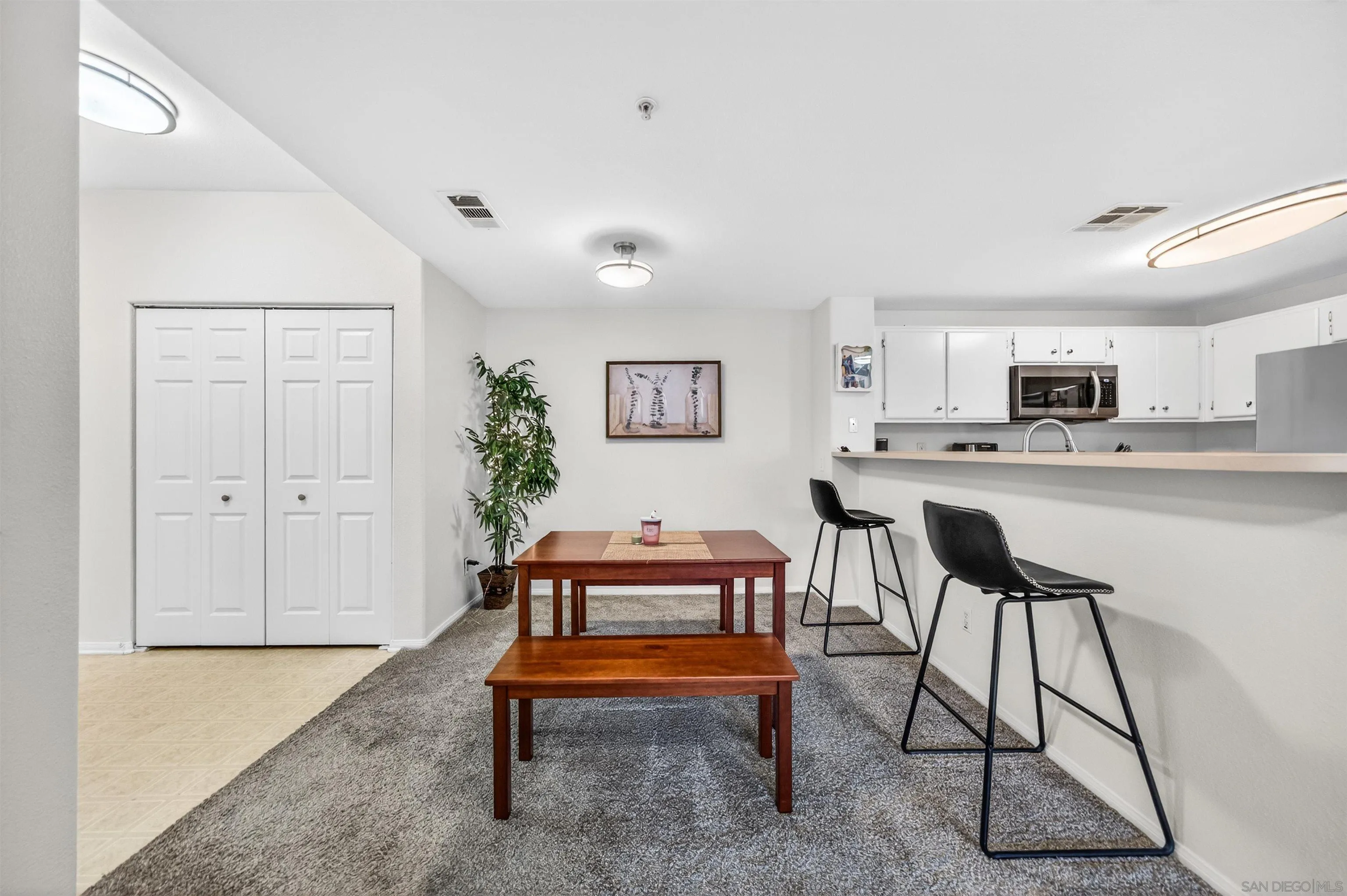 44706 Adam Lane Temecula, CA 92592 - Photo 8 of 36 a living room with furniture and a kitchen view