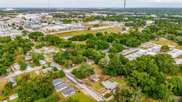 an aerial view of residential building and lake view