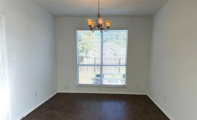 a window in an empty room with a window