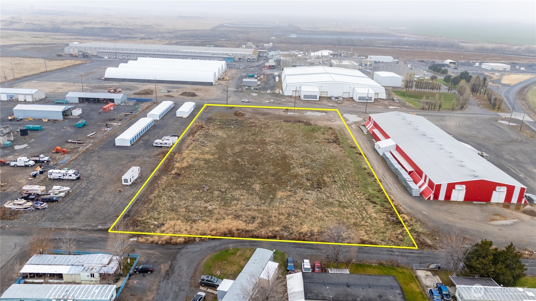 0 Parcel 109-870-179 Connell, WA 99326 - Photo 3 of 7 an aerial view of residential houses with outdoor space