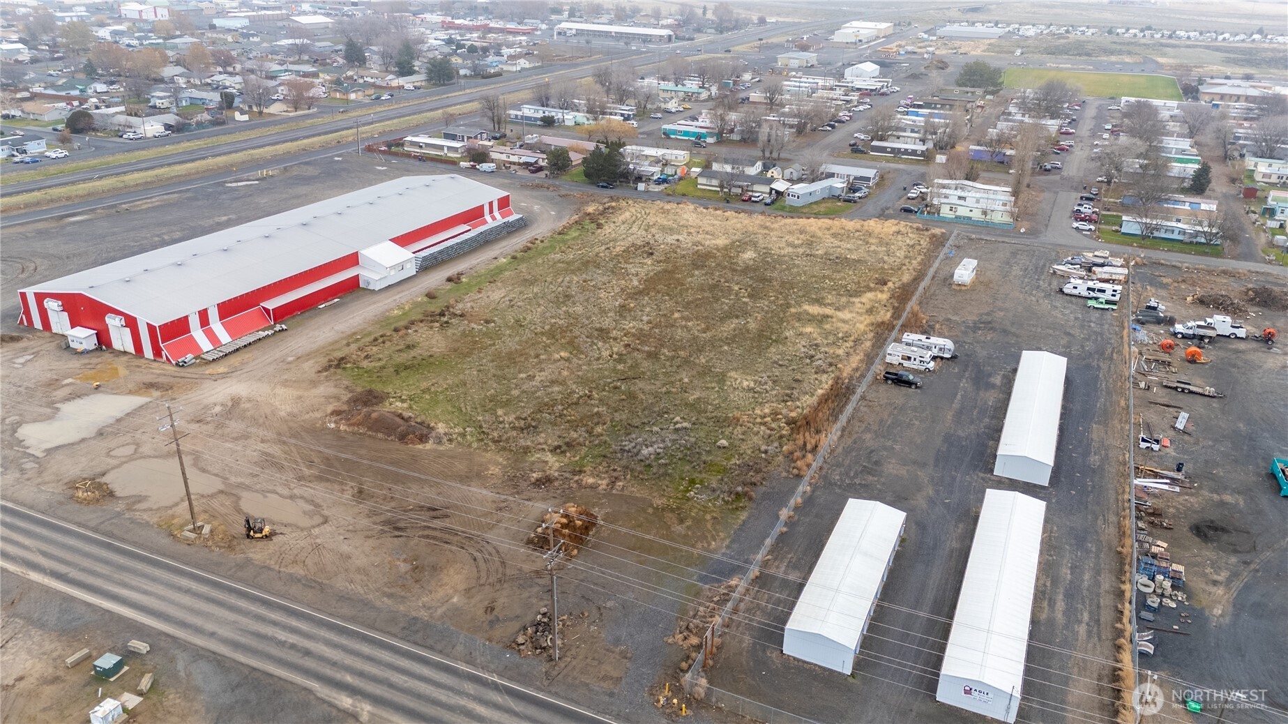 0 Parcel 109-870-179 Connell, WA 99326 - Photo 6 of 7 an aerial view of residential houses with yard