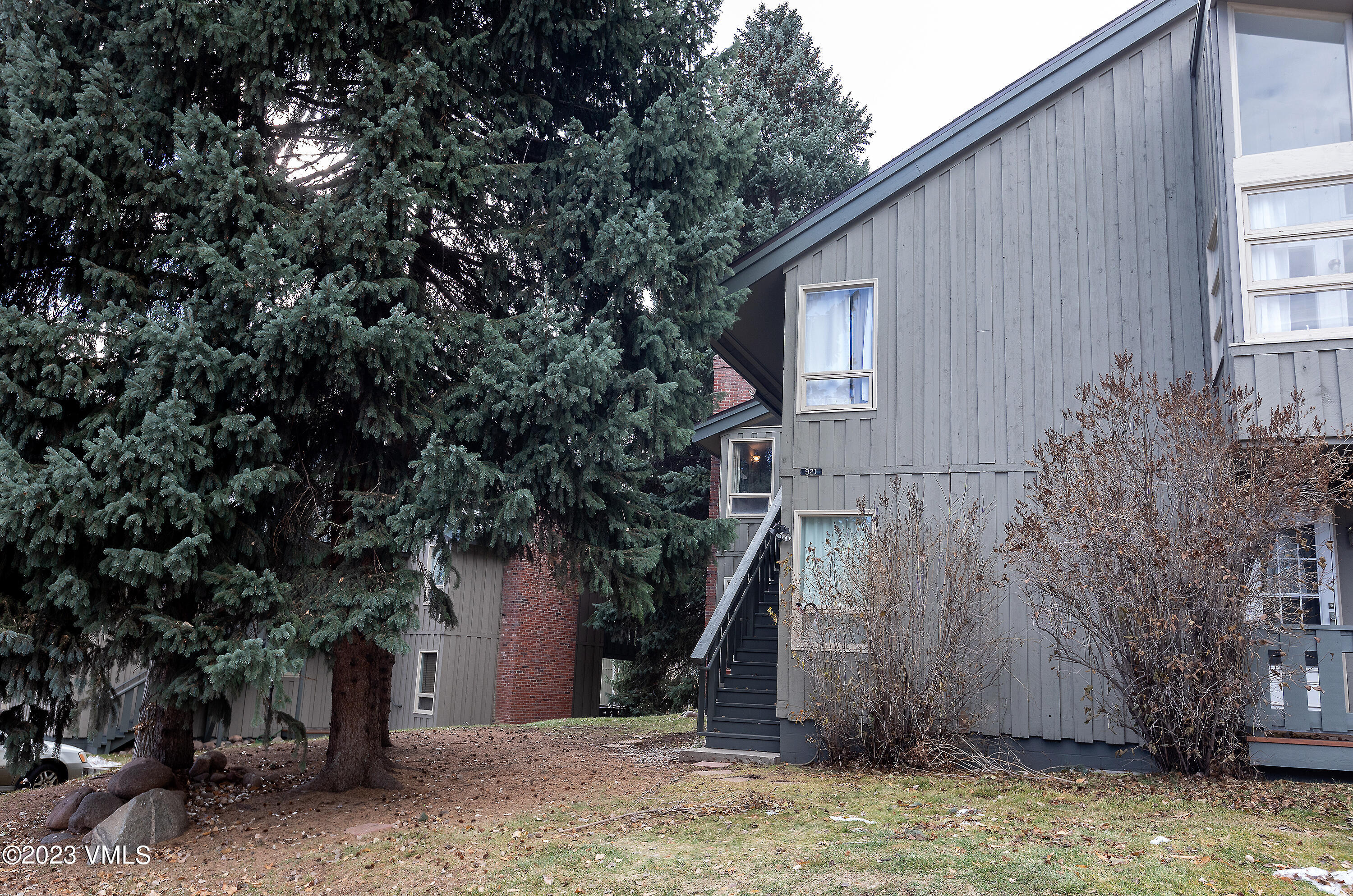 921 Red Sandstone Road, Unit D5 Vail, CO 81657 - Photo 13 of 16 a view of a house with a tree
