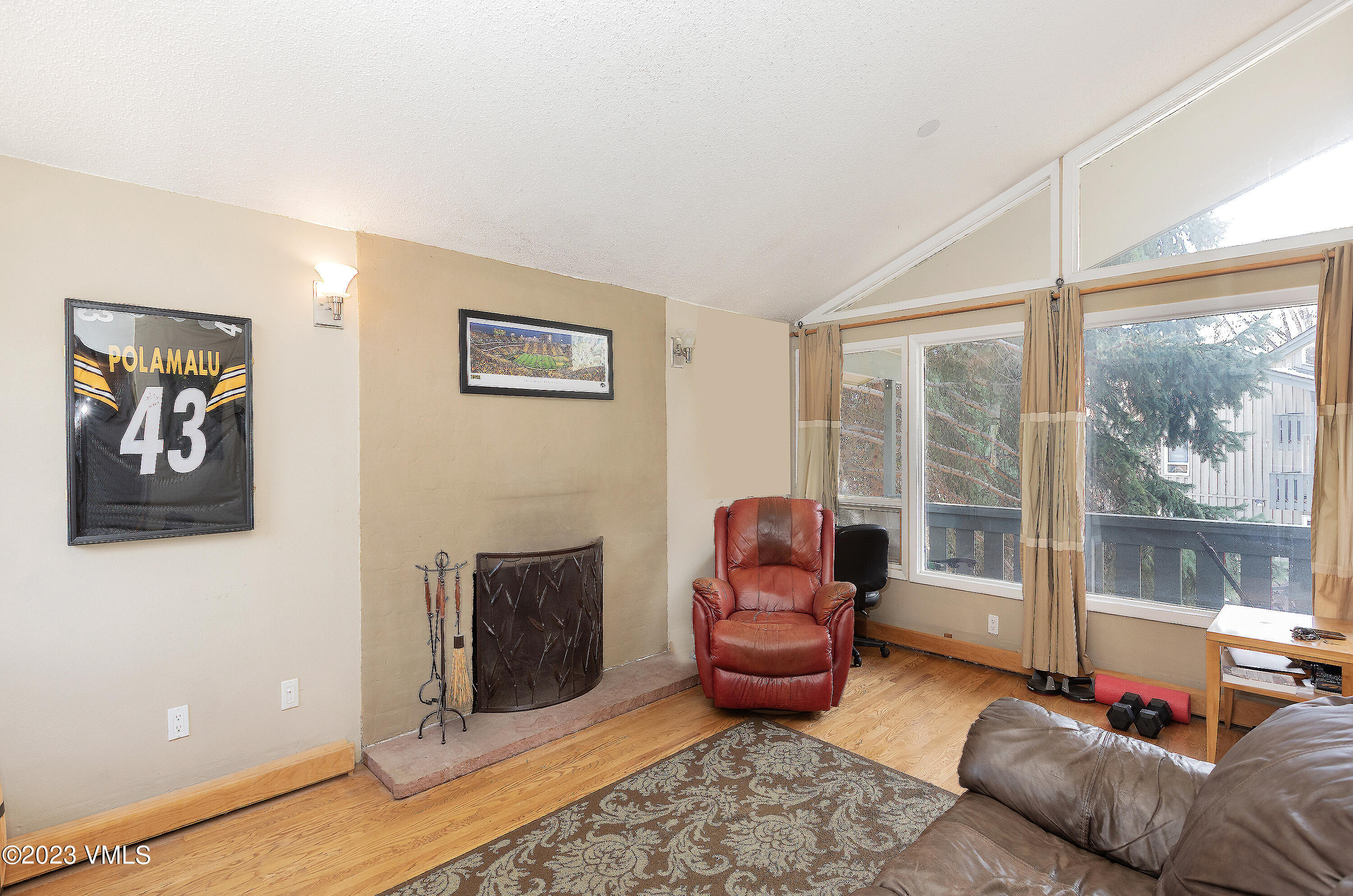 921 Red Sandstone Road, Unit D5 Vail, CO 81657 - Photo 3 of 16 a living room with furniture rug and window
