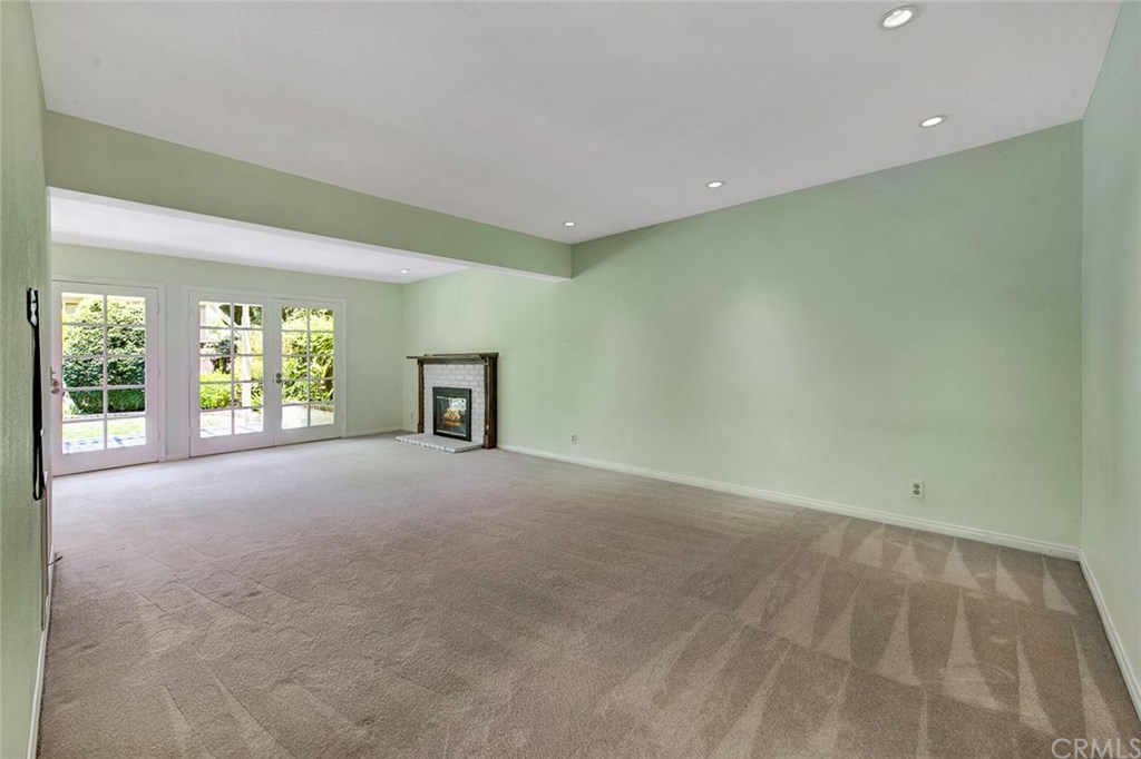 8 Bull Run Irvine, CA 92620 - Photo 25 of 52 Large family room with double French doors and recessed lighting