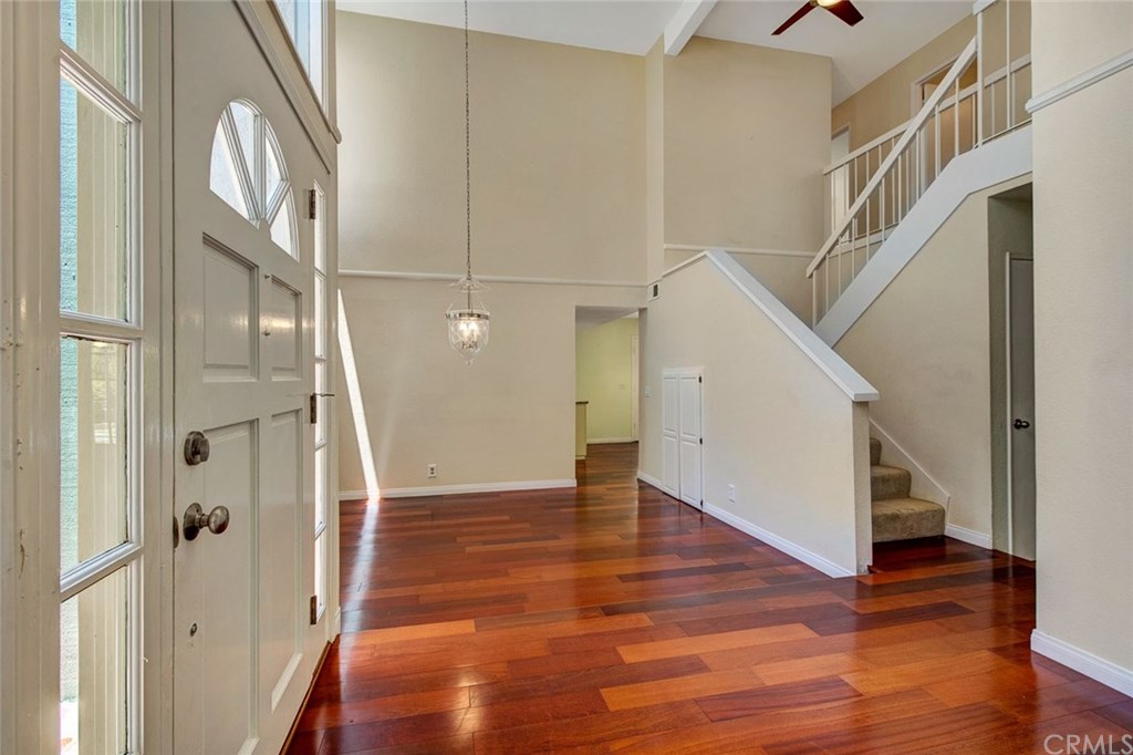 8 Bull Run Irvine, CA 92620 - Photo 10 of 52 View of formal dining which offers high ceiling and wood flooring