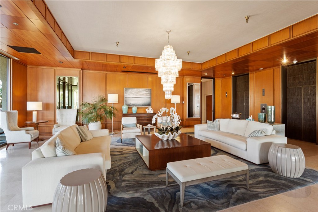601 Lido Park Drive, Unit 6F Newport Beach, CA 92663 - Photo 19 of 28 a living room with furniture and a large window