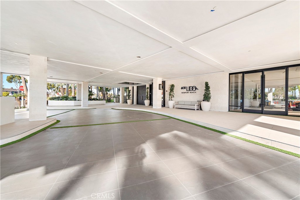 601 Lido Park Drive, Unit 6F Newport Beach, CA 92663 - Photo 26 of 28 a view of a hall with the floor