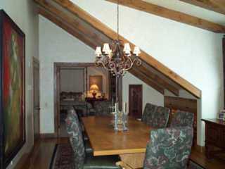 160 Cresta (alpine Club, Unit R403 Edwards, CO 81632 - Photo 5 of 8 a view of living room with furniture and a chandelier