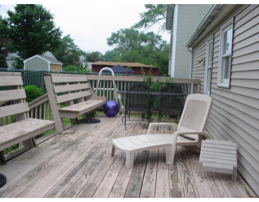 196 Arnold Avenue Springfield, MA 01119 - Photo 3 of 14 a view of a chairs with a table in balcony