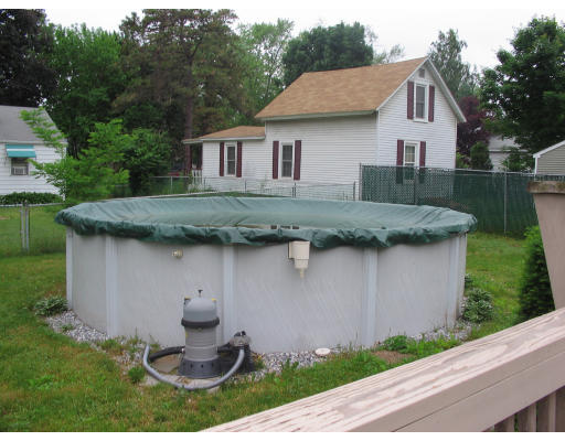 196 Arnold Avenue Springfield, MA 01119 - Photo 4 of 14 a view of a house with backyard tub and garden